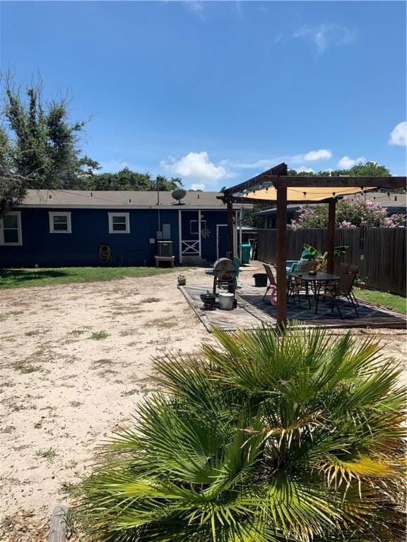 rear view of house with a patio