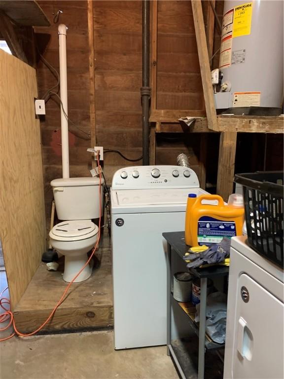 washroom featuring washer / clothes dryer and water heater