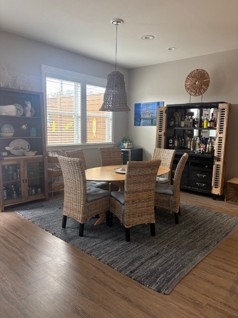 dining space featuring wood finished floors