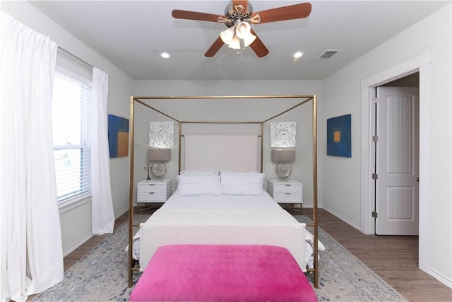 101 Boardwalk Ave, Rockport, TX 78382 - bedroom with a ceiling fan, visible vents, recessed lighting, wood finished floors, and baseboards