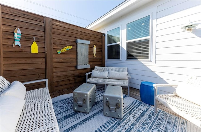 101 Boardwalk Ave, Rockport, TX 78382 - wooden deck featuring outdoor lounge area