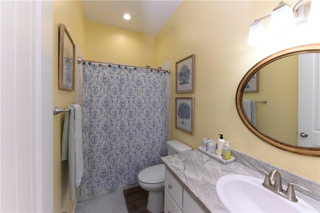 101 Boardwalk Ave, Rockport, TX 78382 - full bathroom with recessed lighting, curtained shower, vanity, and toilet