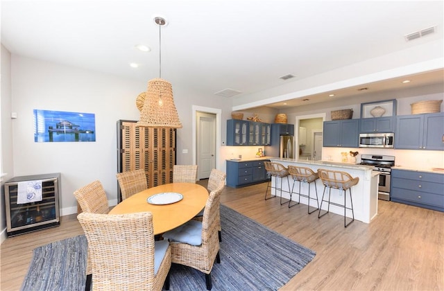 101 Boardwalk Ave, Rockport, TX 78382 - dining space featuring light wood-style floors, visible vents, and recessed lighting