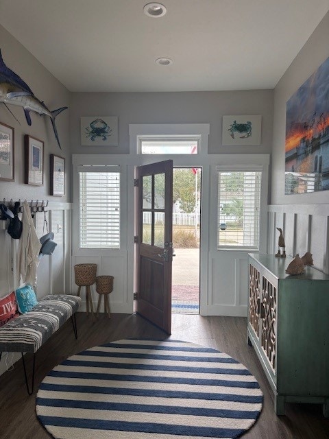 entryway with wood finished floors