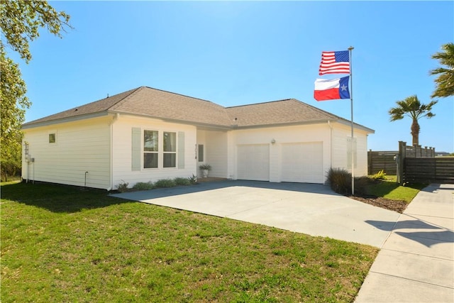 101 Boardwalk Ave, Rockport, TX 78382 - single story home featuring an attached garage, a shingled roof, concrete driveway, and fence
