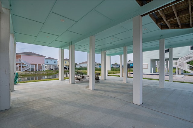 view of patio featuring a water view