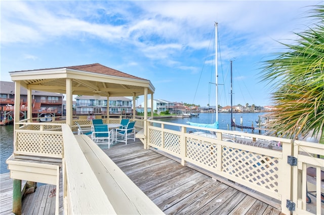 dock area with a water view