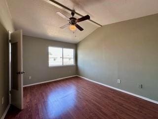 unfurnished room with baseboards, ceiling fan, wood finished floors, and lofted ceiling