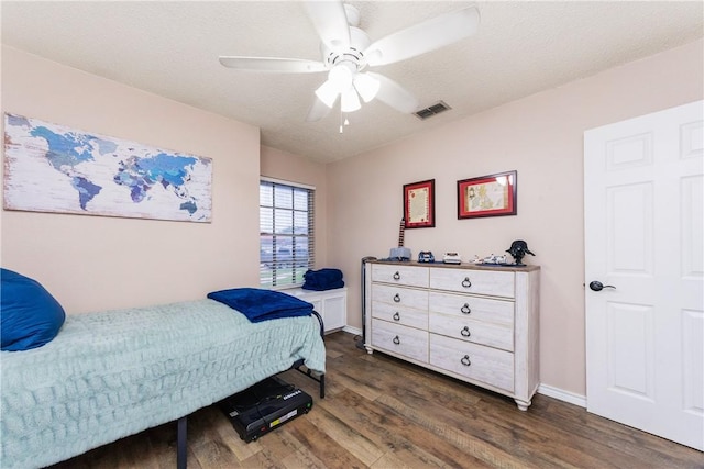6309 Brianna Cir, Corpus Christi, TX 78414 - bedroom with dark wood-style floors and ceiling fan