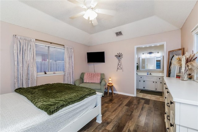 6309 Brianna Cir, Corpus Christi, TX 78414 - bedroom with a tray ceiling, dark wood finished floors, ceiling fan, and ensuite bath