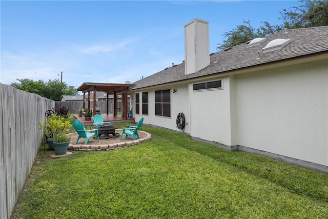 6309 Brianna Cir, Corpus Christi, TX 78414 - fenced backyard with an outdoor fire pit and a patio