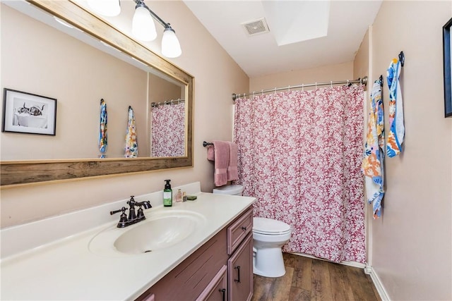 6309 Brianna Cir, Corpus Christi, TX 78414 - full bathroom with vanity, wood finished floors, and curtained shower