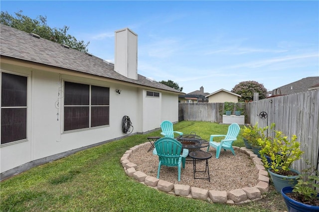 6309 Brianna Cir, Corpus Christi, TX 78414 - fenced backyard with an outdoor fire pit