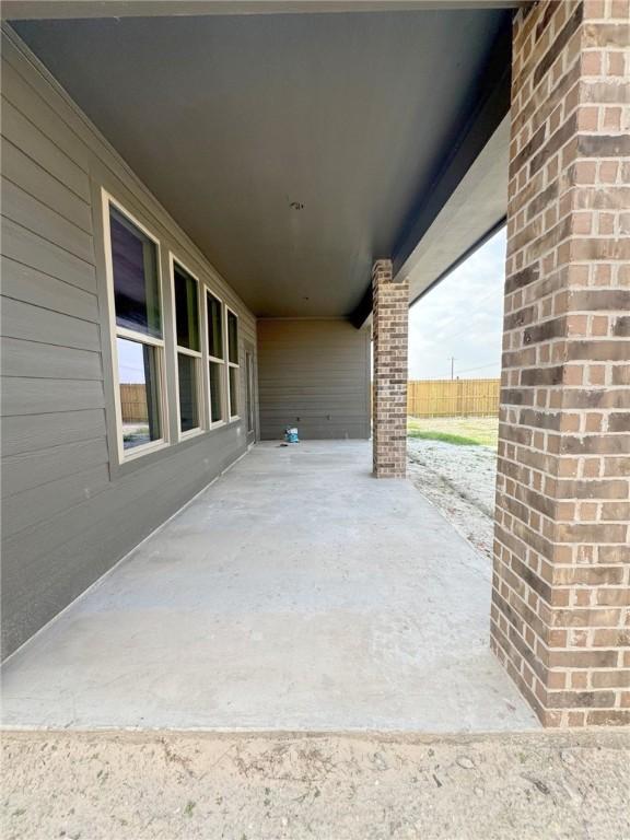 view of patio with fence