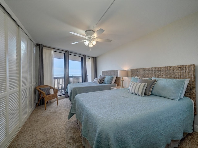 bedroom with carpet, ceiling fan, and access to exterior