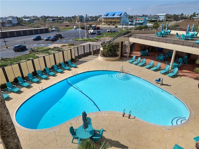 view of pool featuring a patio area