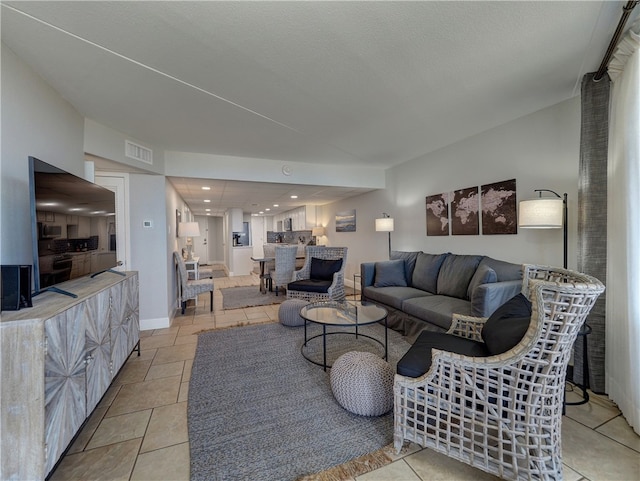 living room featuring light tile patterned floors