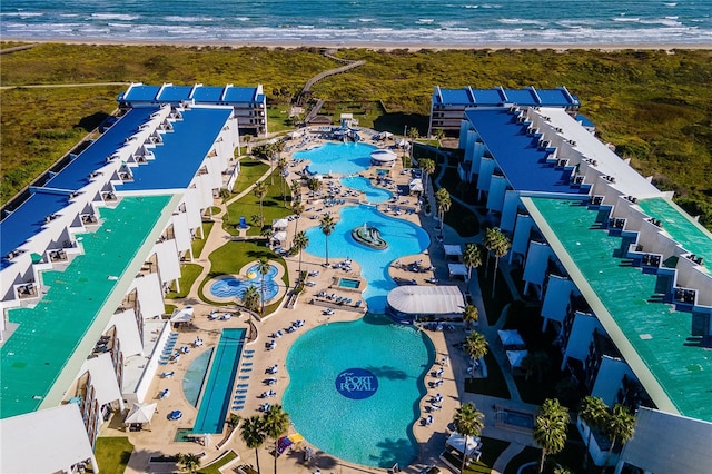 bird's eye view with a beach view and a water view