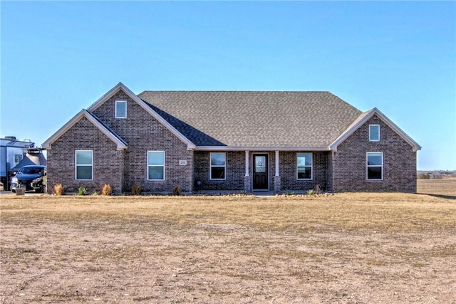 view of front of home with a front lawn