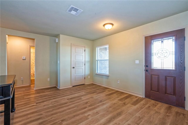 entrance foyer with hardwood / wood-style floors