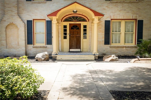 1107 N Adams St, Beeville, TX 78102 - property entrance with brick siding