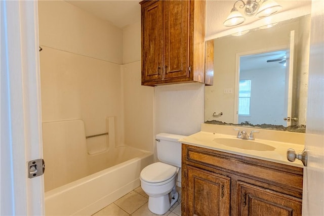 full bathroom with tile patterned flooring, vanity, bathtub / shower combination, and toilet