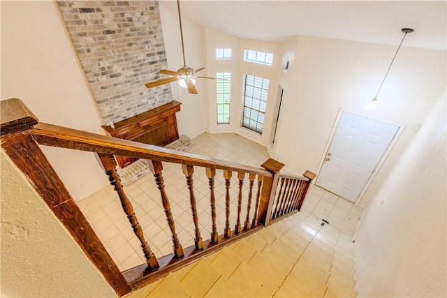 stairs featuring tile patterned flooring