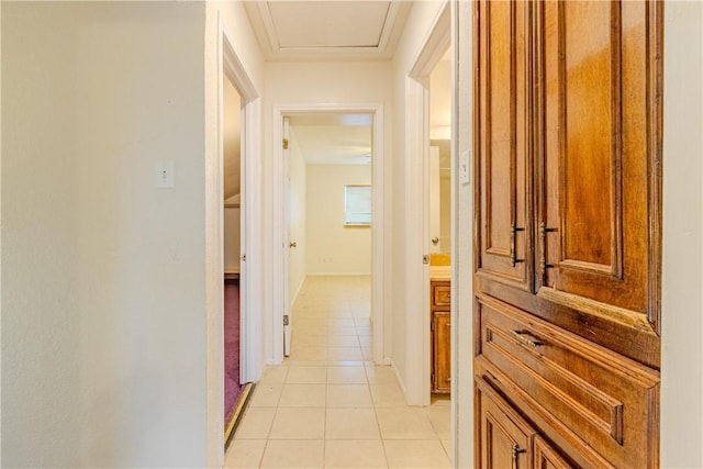 corridor featuring light tile patterned flooring