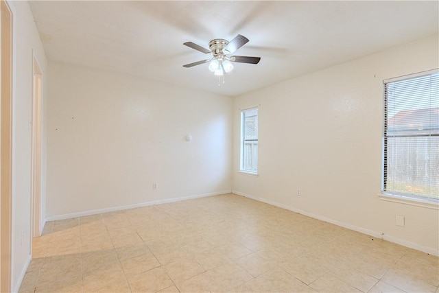 unfurnished room with ceiling fan