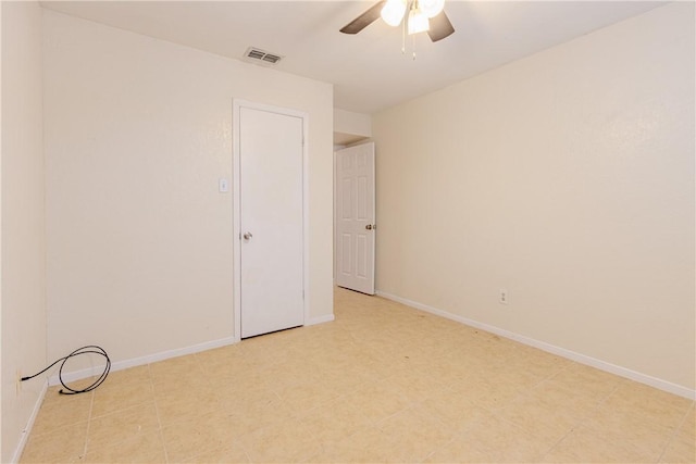 unfurnished bedroom featuring ceiling fan