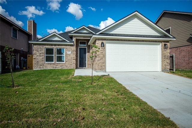 view of front facade featuring a garage and a front yard