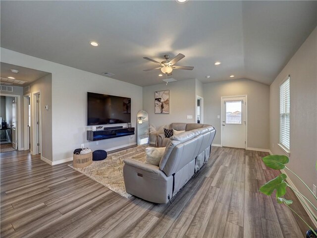 2693 Excelsior Blvd, Corpus Christi, TX 78415 - living room with wood finished floors, ceiling fan, recessed lighting, and lofted ceiling