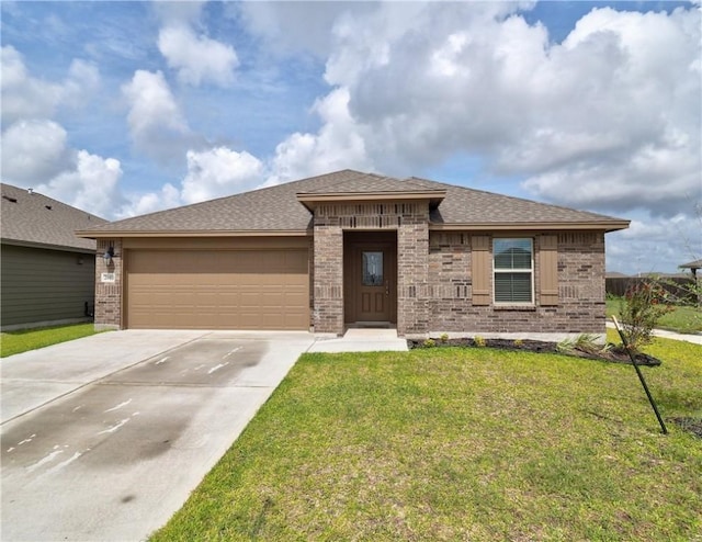 2693 Excelsior Blvd, Corpus Christi, TX 78415 - prairie-style house featuring brick siding, driveway, a front yard, a garage, and a shingled roof