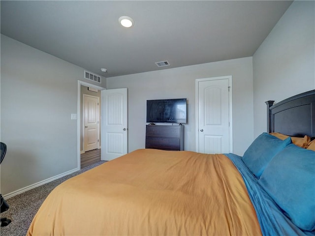 2693 Excelsior Blvd, Corpus Christi, TX 78415 - bedroom with baseboards and carpet flooring