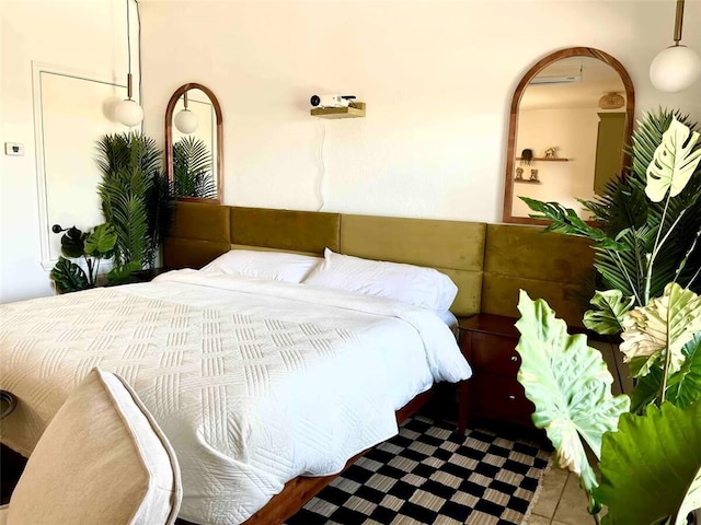 bedroom featuring tile patterned floors