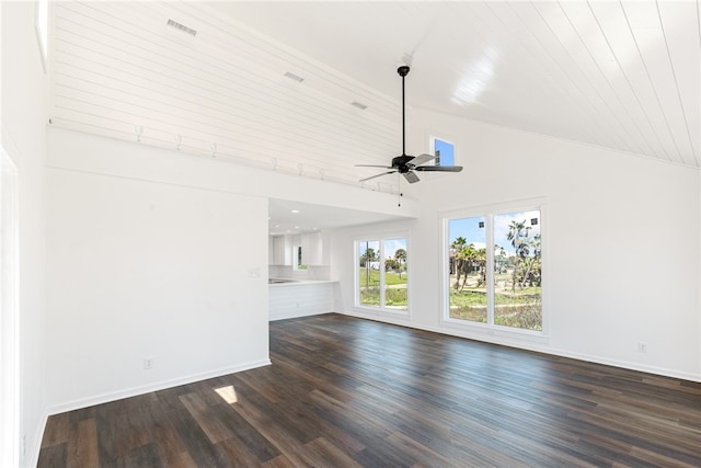 unfurnished living room with dark wood-type flooring, ceiling fan, and high vaulted ceiling