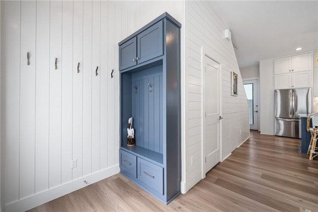 mudroom with recessed lighting and light wood-type flooring