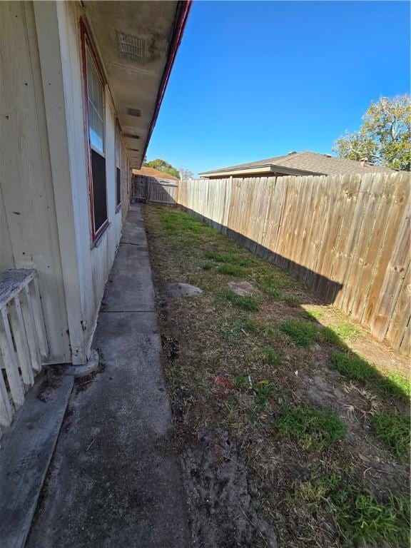 view of yard featuring fence