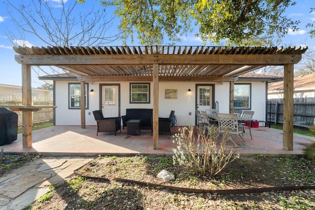 back of house with fence, a patio, and a pergola