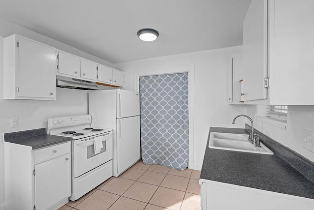 kitchen featuring under cabinet range hood, white appliances, a sink, white cabinetry, and dark countertops