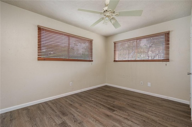 1576 Vineyard, Ingleside, TX 78362 - empty room featuring baseboards, wood finished floors, ceiling fan, and a textured ceiling