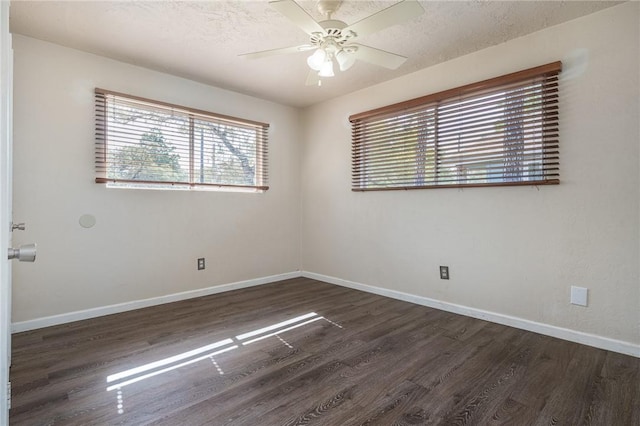 1576 Vineyard, Ingleside, TX 78362 - unfurnished room with a textured ceiling, baseboards, wood finished floors, and a ceiling fan