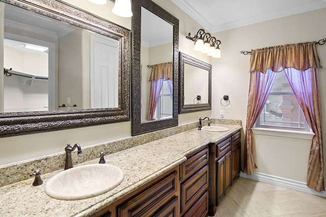 bathroom featuring tile patterned floors, vanity, and crown molding