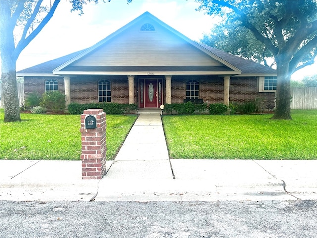 view of front of home with a front lawn