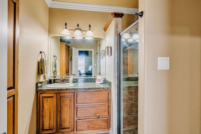5325 Wild Olive, Corpus Christi, TX 78413 - bathroom with ornamental molding, a shower stall, and vanity