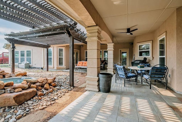 5325 Wild Olive, Corpus Christi, TX 78413 - view of patio / terrace featuring outdoor dining space, a ceiling fan, and a pergola