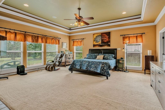 5325 Wild Olive, Corpus Christi, TX 78413 - bedroom with a tray ceiling, crown molding, light colored carpet, and a ceiling fan
