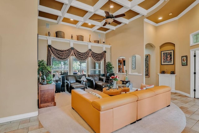 5325 Wild Olive, Corpus Christi, TX 78413 - living area with a towering ceiling, ceiling fan, ornamental molding, baseboards, and beam ceiling