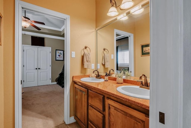 5325 Wild Olive, Corpus Christi, TX 78413 - full bathroom with double vanity, crown molding, and a ceiling fan