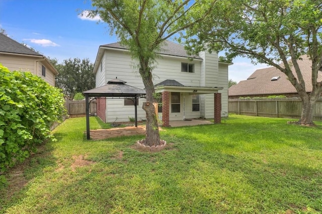 6709 Pembrock, Corpus Christi, TX 78414 - rear view of property featuring a gazebo, a patio area, and roof with shingles